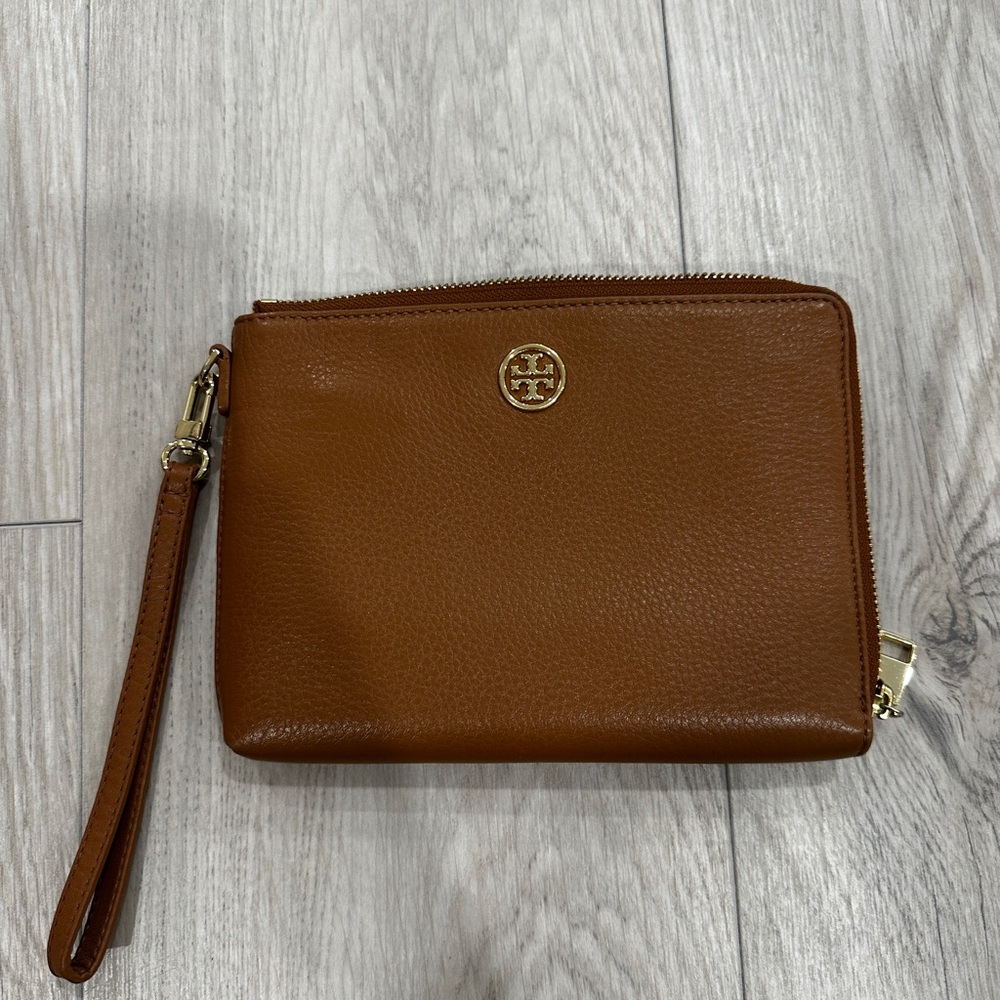 TORY BURCH brown leather wristlet. Never used.